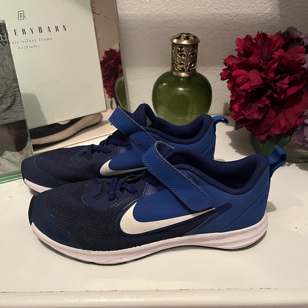 Boys blue Nike shoes